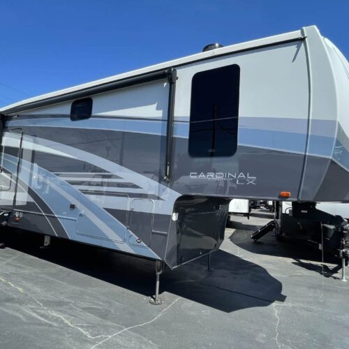 2022 Cardinal Luxury 380RL. FULL PAINT EDITION. From Forest River's Cardinal Luxury line, the 380RL is a beautiful rear living room fifth wheel with a front master bedroom suite with a huge mid bathroom. The rear living room features a hide a bed couch and theatre style recliners across from the flat screen TV. The mid kitchen features residential style appliances, including a huge oven. The king size bedroom has a master bathroom with a huge shower and a long bathroom counter. There is a washer/dryer hook up in one of the kitchen closets. The outside features a huge front storage bay, 6 point auto leveling jacks and a beautiful full painted exterior.
